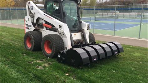 aerator attachment for skid steer|attachments for cat skid steer.